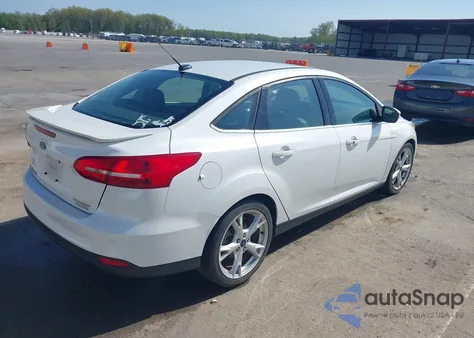2016 Ford Focus Titanium из США, поврежденный, VIN 1FADP3J23GL358772
